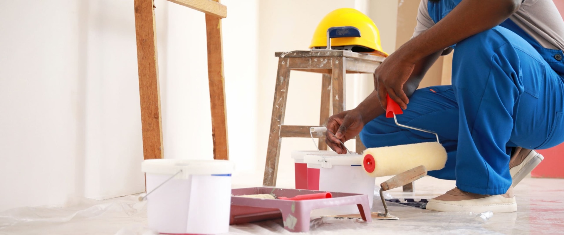 How many man hours does it take to paint the interior of a house?
